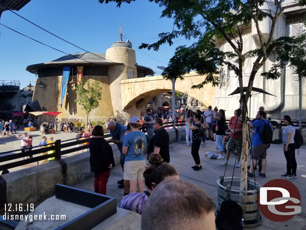 In line to try the super zoom magic shot from PhotoPass since there were only two groups waiting.