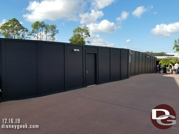Walls up along the walkway from Art of Disney to the restrooms where a new walkway is being added heading toward the Seas.