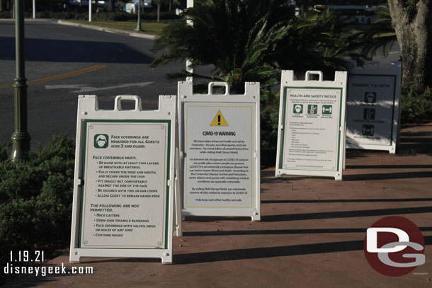 A Frame signs have grown in number since my last visit.  Plenty of rules, warnings and other pieces of information.  These four greet you before a temperature screening on your way to the Magic Kingdom.