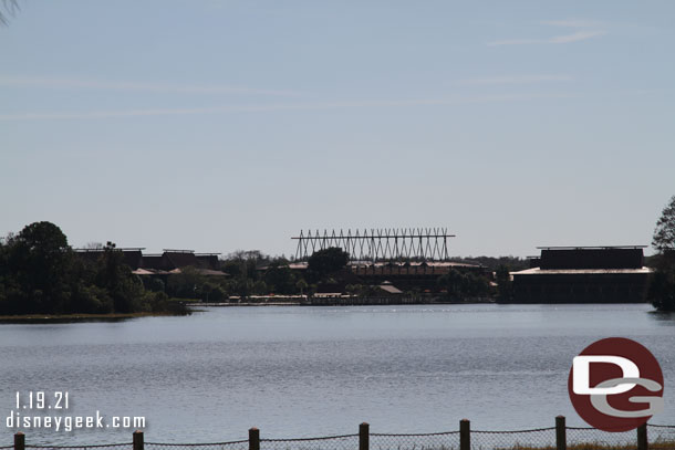 Looking across the Seven Seas Lagoon at the Polynesian Resort.  The roofline of the main building has changed.  