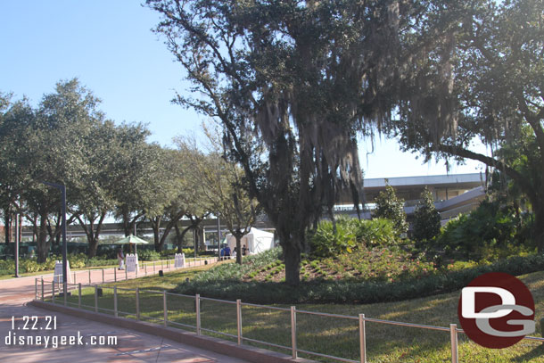 This is the entrance path from the bus area.  The tent is a temperature check and security is beyond that under the Monorail station where the old tram stop used to be.