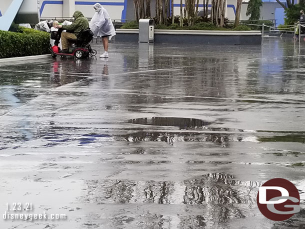 Even with this light rain there were still quite a few puddles in Tomorrowland.