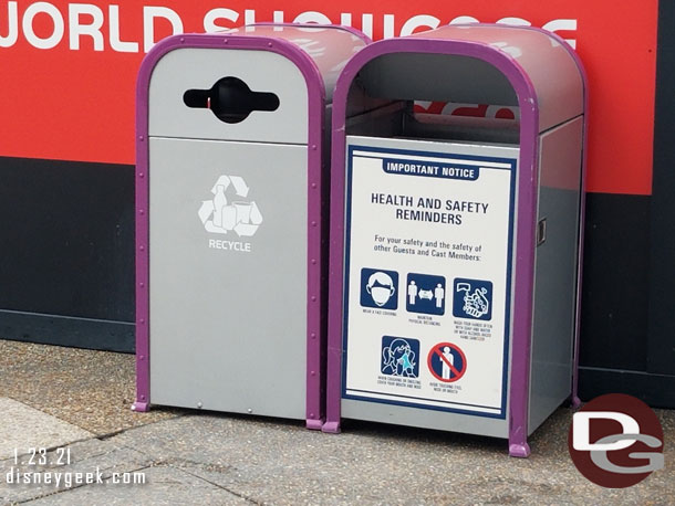 Trashcans throughout WDW featuring health warnings and reminders.