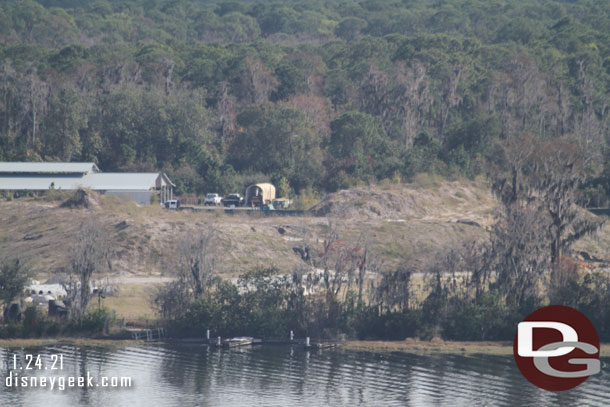 A look across Bay Lake at the paused/stopped construction site for a planned DVC resort.  You can see the edge of the Tri-Circle D Ranch building on the left.