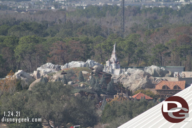 The Seven Dwarfs Mine Train and beyond it the Beast's Castle