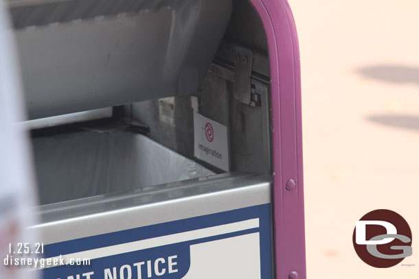 Trashcans are all propped open now.  Inside there is a label of where it belongs.