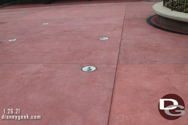 Markers on the ground for the extended Monorail queue which was not in use.