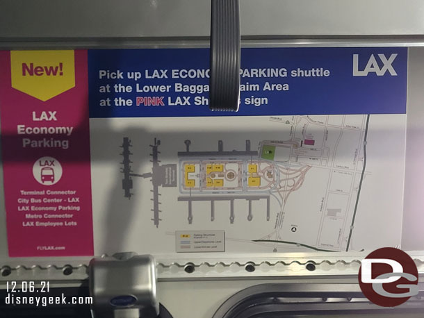 Buses pick up/drop off on the lower level of LAX under cover in the pink zones.