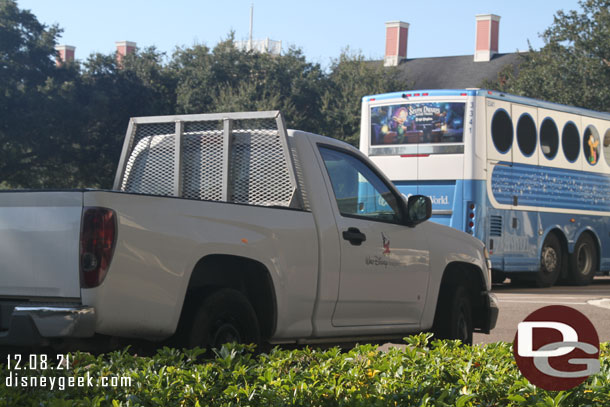 An Imagineering pick up truck parked near by.