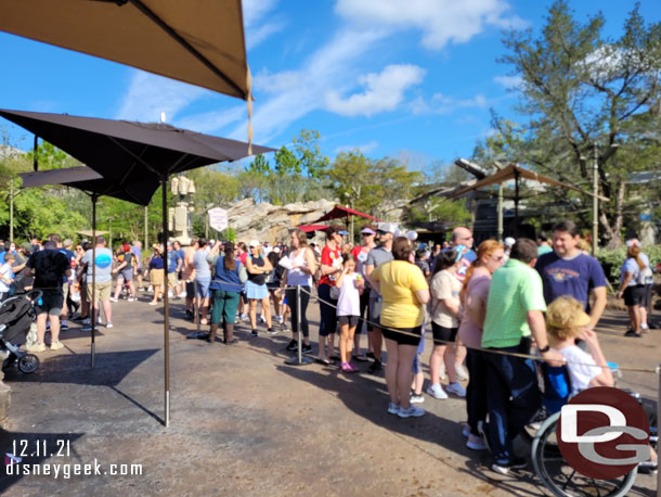 12:10pm - the Lightning Lane was really backed up, filled its queue, extended queue and was heading out toward the walkway.