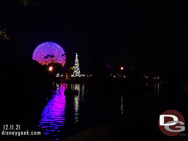 Spaceship Earth and the Christmas Tree across World Showcase Lagoon.
