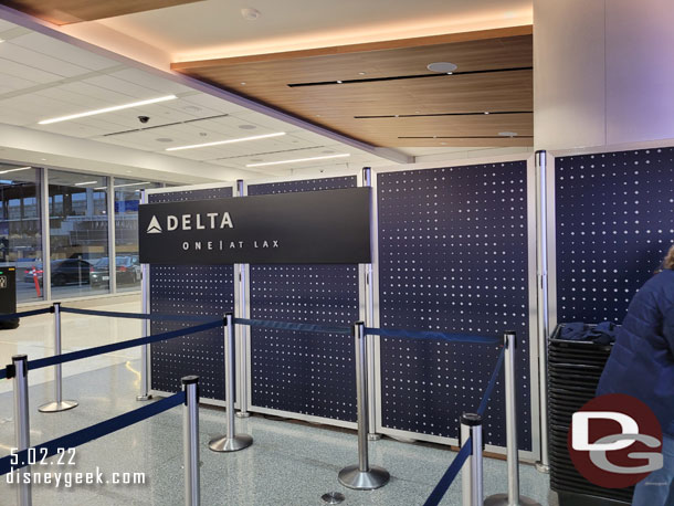 7:45pm - In line at the new Delta check in area. It was busy so  I did not take a picture of the counter.  The Delta One check in area is at the end of the terminal behind that wall.  