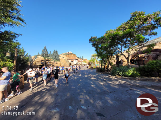 The Seven Dwarfs Mine Train queue ended past the Little Mermaid.  The rest of my group that headed that way were near the end still.