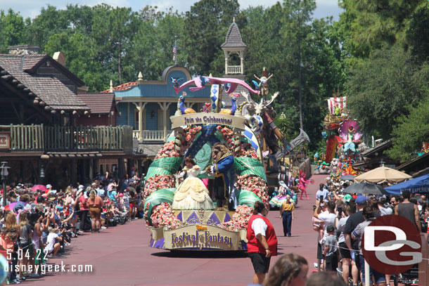 The 12:00pm Festival of Fantasy Parade traveling through Frontierland.