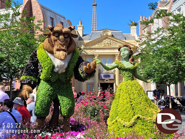 10:17am - In the park and walking through France. The Beauty and the Beast Topiary this morning.