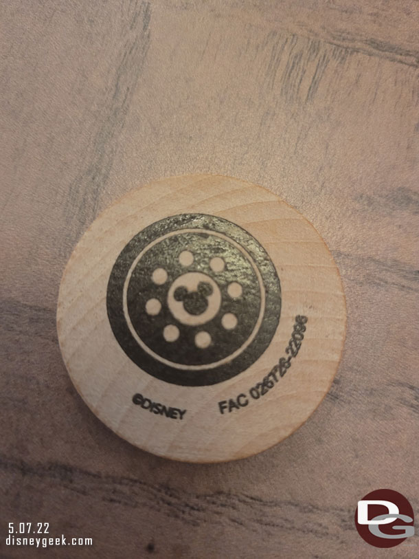 My nephew was given this wooden token on the Skyliner yesterday.