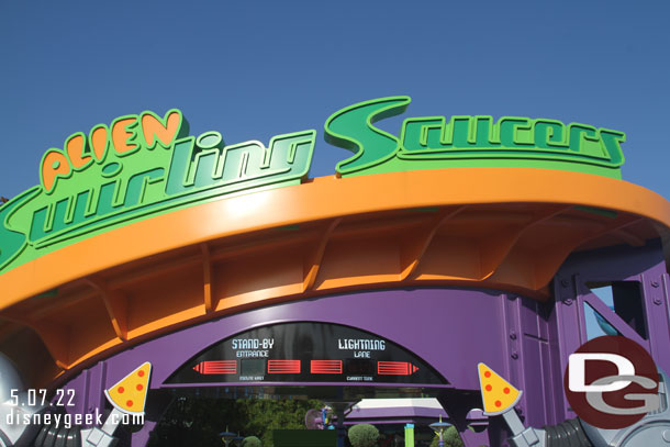 The Slinky Dog gang actually finished before us due to a couple minute delay and longer walk for us.  We were going to ride a second time but the nephews wanted to do Swirling Saucers instead so we went that way.