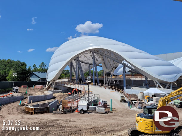 Wider view of the entrance to TRON.  There will be a walkway to Fantasyland on the left that goes under the ramp in the center of the picture.