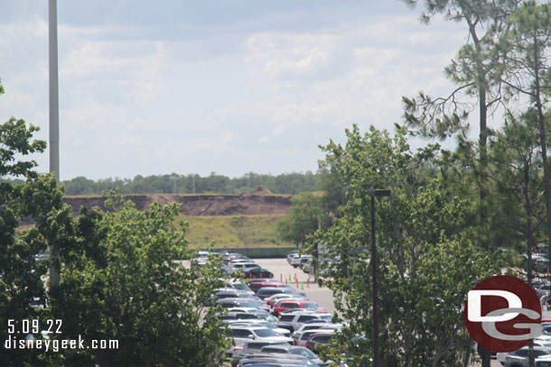 In the distance you can see some of the big mound of dirt in the Magic Kingdom parking lot has been used elsewhere.