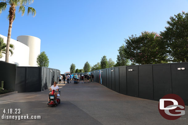 I opted to enter the park just to the right of Spaceship Earth which takes you through a corridor of construction walls.