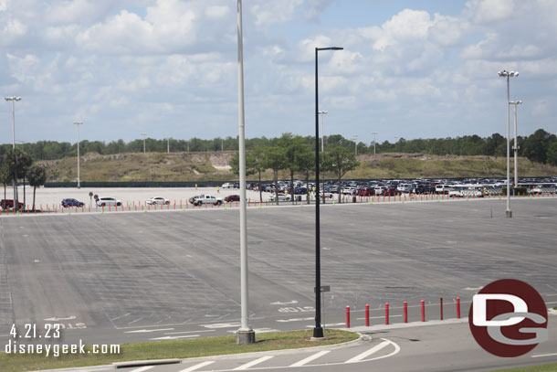 The mound of dirt in the Magic Kingdom parking lot is still sizable.