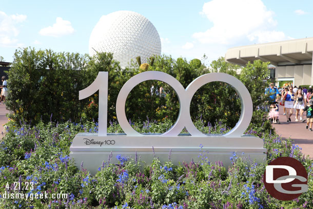 The Epcot Disney 100 logo is in World Celebration