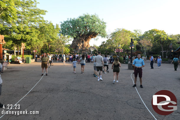 Cast members and tape to guide you to the park or the waiting area.