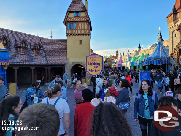 The Lightning Lane return line stretch out toward the carousel for Peter Pan