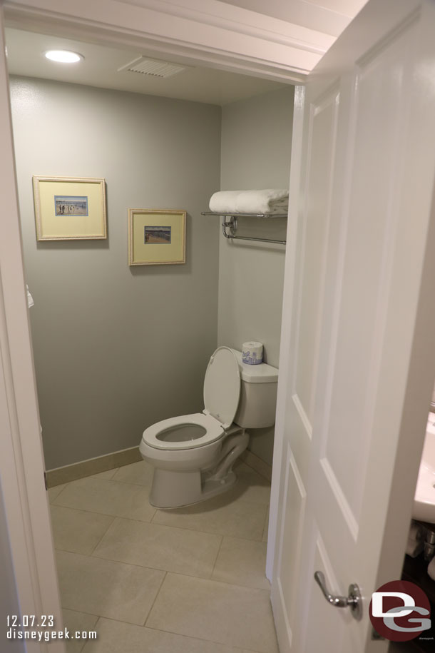 The toilet room was awkward as the door opened right into the sink area.