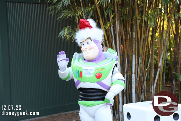 Buzz greeting guests near Toy Story Land