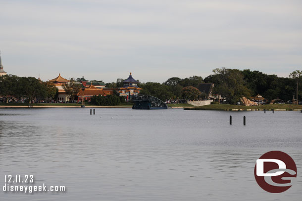 Two more Luminous barges being driven into position in  World Showcase Lagoon