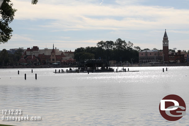 The center barge is out in the lagoon again/still.