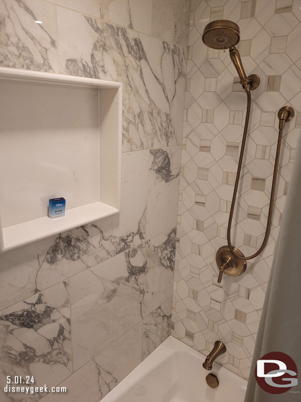 Then a tub with a shower on the left.