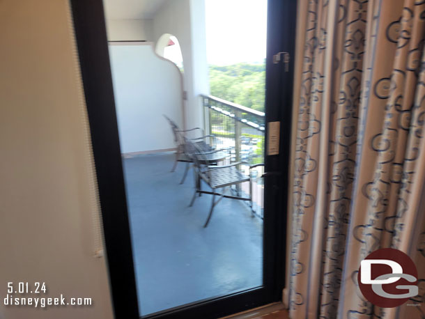A door leading from the family room to the balcony off the master bedroom.