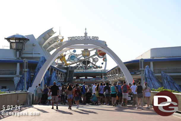 8:26am - Early entry guests waiting to be let into Tomorrowland.