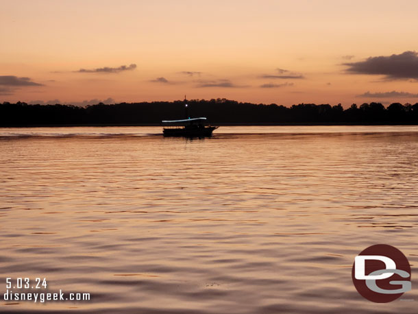 The launches are leaving backstage and crossing Bay Lake as the sun starts to rise.