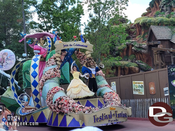 Belle and the Beast leading off the Festival of Fantasy Parade at the Magic Kingdom