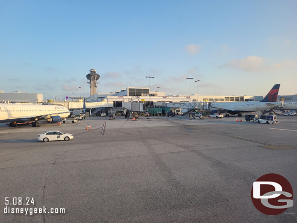 7:12pm - Stopped short of the gate and waiting for the ground crew. This was after stopping to wait for the plane to get pushed out that was there.