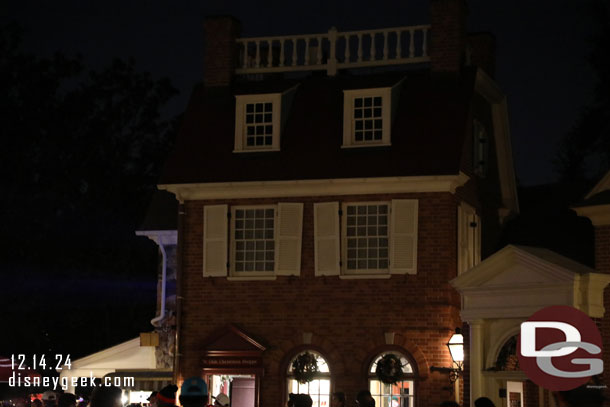 Waiting to see the Ichabod Crane projection in the window above the Christmas store