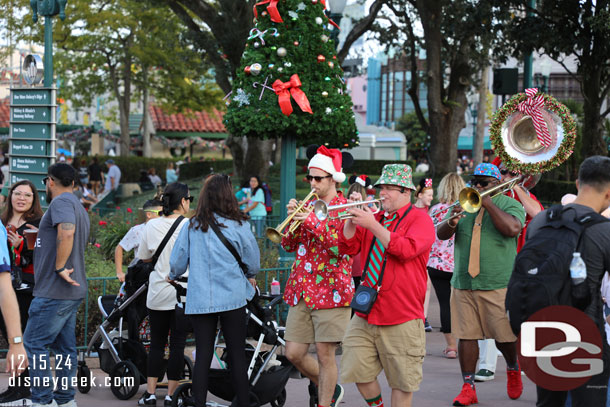 The Holiday Spirit Band arriving for their performance in the Animation Courtyard