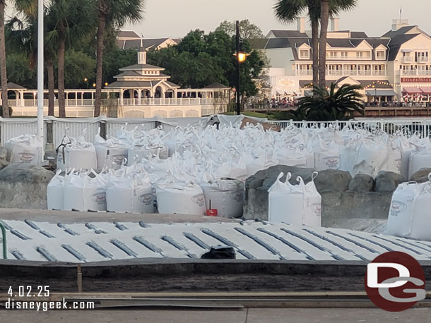 Sand has arrived as they prepare the pool to reopen.