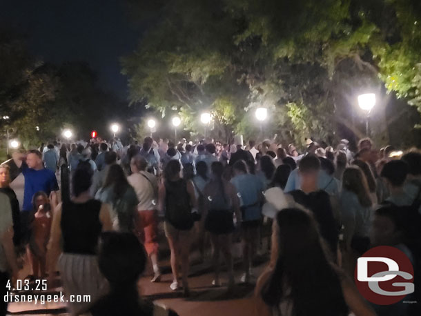 A healthy crowd this evening traveling up the walkway toward the EPCOT resorts