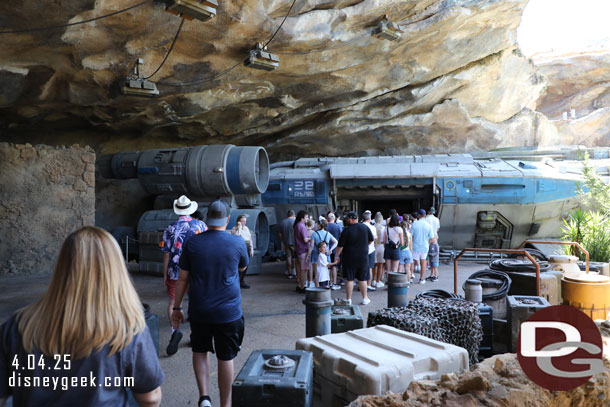 We were held and then after this group had started to board the transport we were directed across the walkway through a door.